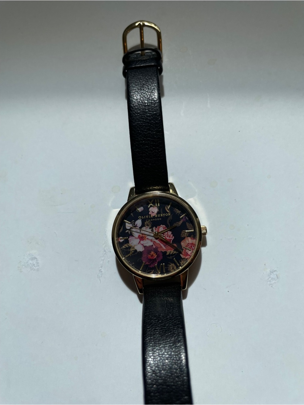 OLIVIA BURTON Black Floral Dial Watch with Gold Case and Black Leather Strap